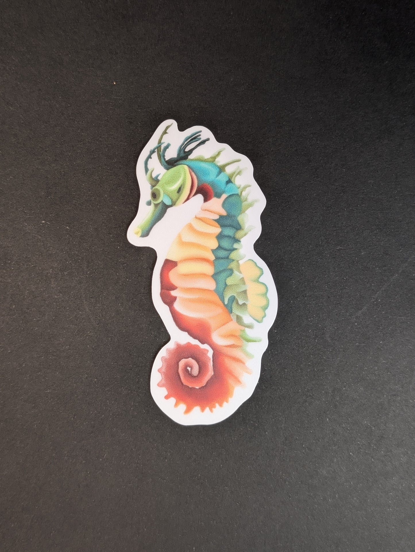 Colorful seahorse sticker on a black background