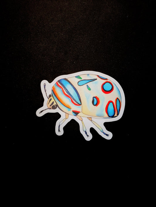 Vinyl sticker of a Picasso bug created with watercolor. Sticker is on a black backgorund.